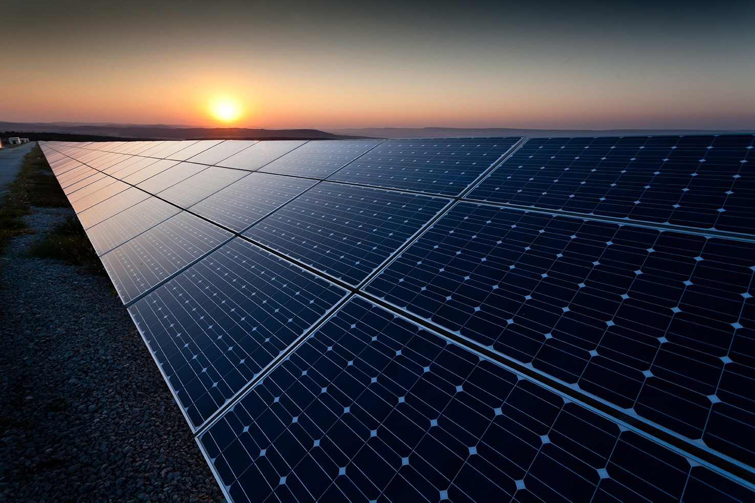 Image of solar panels at dusk for Energy Technology blog post