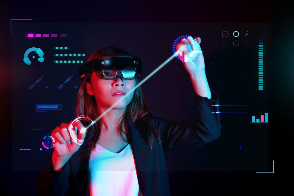 Woman using smart glasses to interact with an augmented reality interface